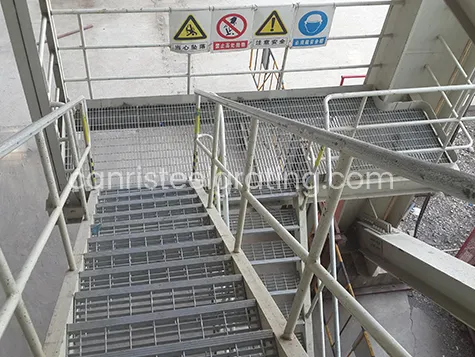 Galvanized steel grating used for stair treads in power plant