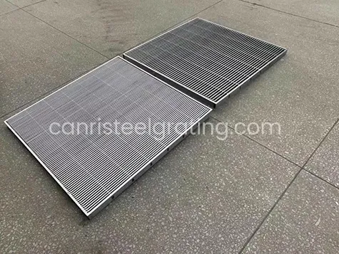 Dense stainless steel drain grating